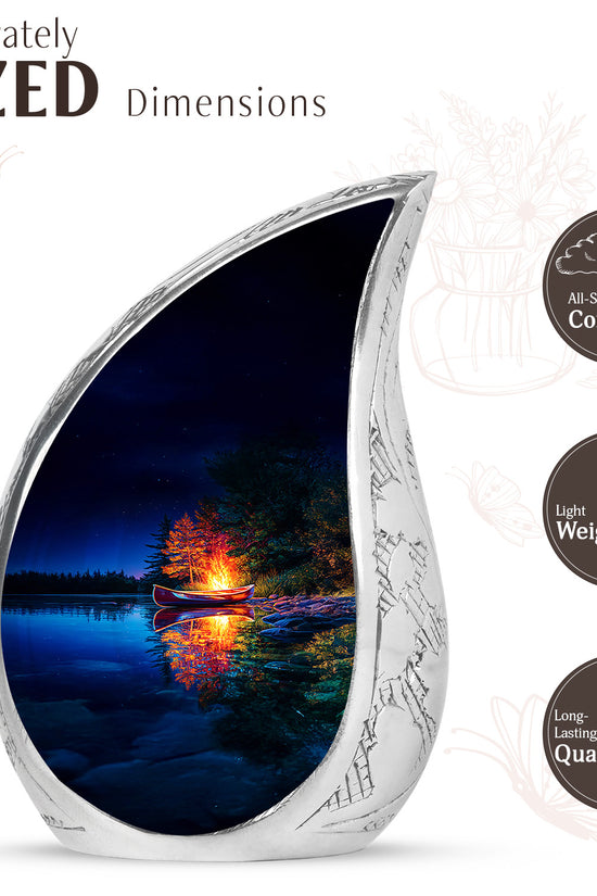 Dusty Blue Campfire Cremation Urn angled view of lid and engraved motif - rounded teardrop campfire design with delicate detail - mini keepsake memorial for portion of cremation ashes