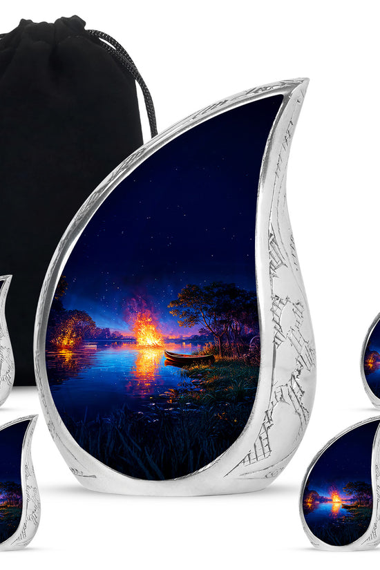 Powder Blue Campfire Cremation Urn side profile showing urn shape - rounded teardrop campfire design with delicate detail - memorial set with one large and four small urns