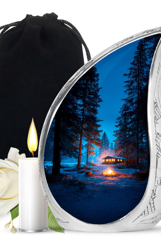 Powder Blue Campfire Cremation Urn front view showing detailed design - flowing teardrop campfire silhouette on curved aluminum - full-size 10 inch 200 cubic inch adult cremation urn