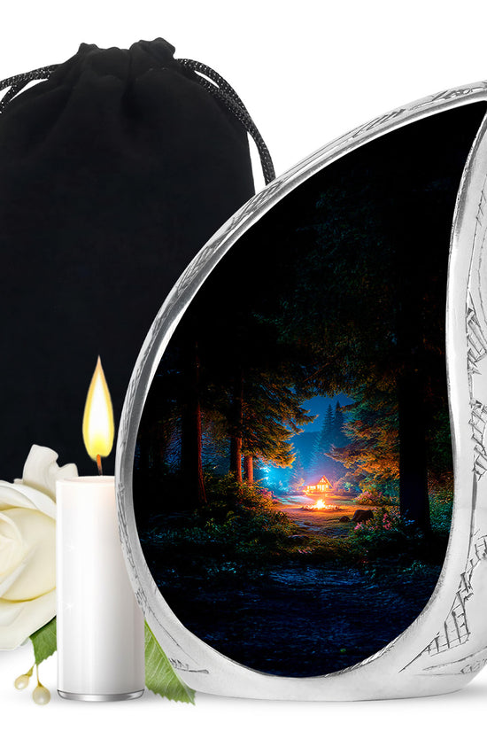 Deep Black Campfire Cremation Urn front view showing detailed design - flowing teardrop campfire silhouette on curved aluminum - full-size 10 inch 200 cubic inch adult cremation urn