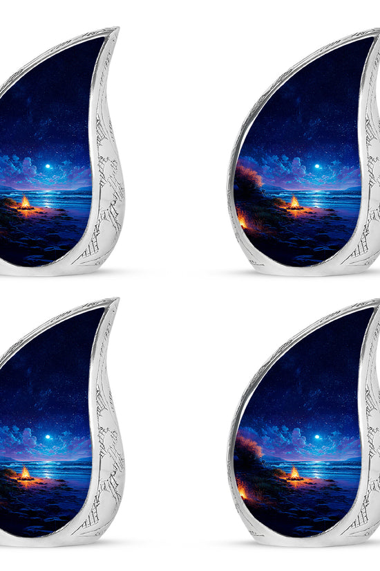 Twilight Blue Campfire Cremation Urn close-up of engraving and surface detail - graceful tear-shaped urn with campfire motif - 10 inch aluminum urn for cremated remains