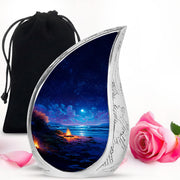 Calming Blue Campfire Cremation Urn front view showing detailed design - graceful tear-shaped urn with campfire motif - full-size 10 inch 200 cubic inch adult cremation urn