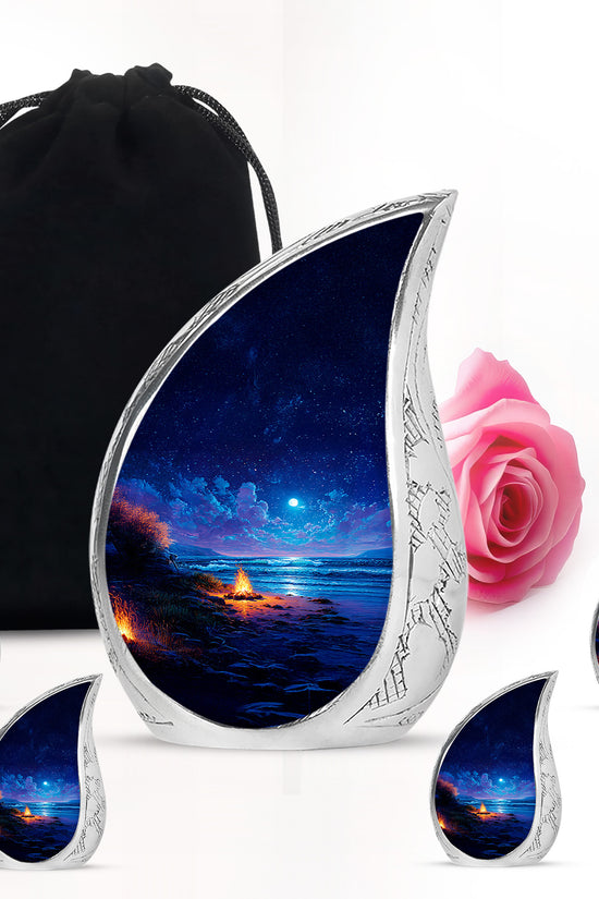 Azure Campfire Cremation Urn side profile showing urn shape - flowing teardrop campfire silhouette on curved aluminum - memorial set with one large and four small urns