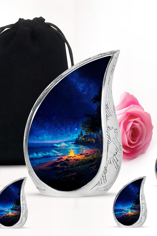 Slate Blue Campfire Cremation Urn side profile showing urn shape - flowing teardrop campfire silhouette on curved aluminum - memorial set with one large and four small urns