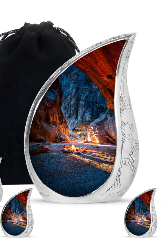 Dusty Blue Campfire Cremation Urn side profile showing urn shape - rounded teardrop campfire design with delicate detail - memorial set with one large and four small urns