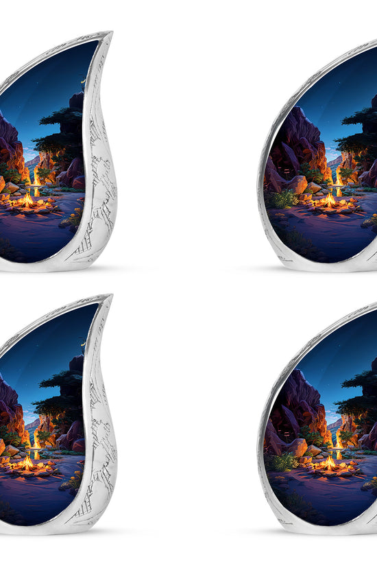 Royal Blue Campfire Cremation Urn close-up of engraving and surface detail - graceful tear-shaped urn with campfire motif - 10 inch aluminum urn for cremated remains