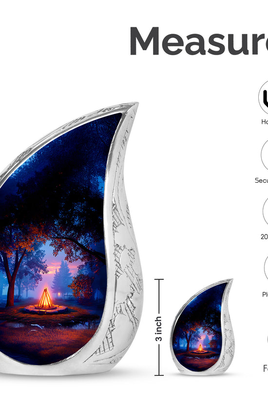 Deep Black Campfire Cremation Urn angled view of lid and engraved motif - rounded teardrop campfire design with delicate detail - mini keepsake memorial for portion of cremation ashes