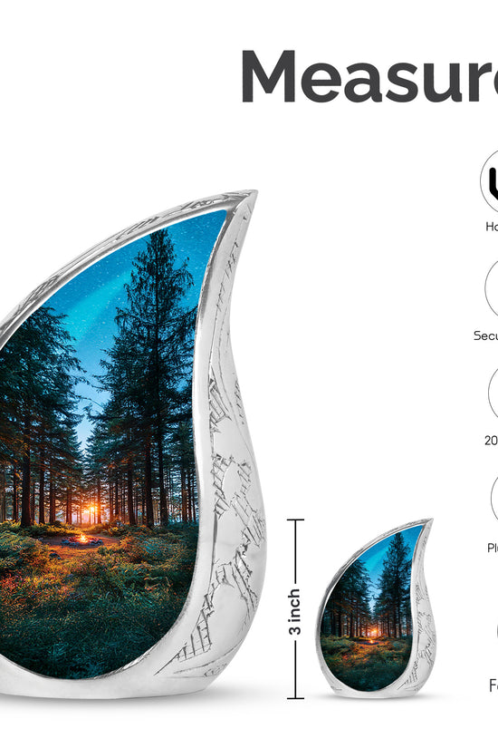 Navy Blue Campfire Cremation Urn angled view of lid and engraved motif - flowing teardrop campfire silhouette on curved aluminum - mini keepsake memorial for portion of cremation ashes