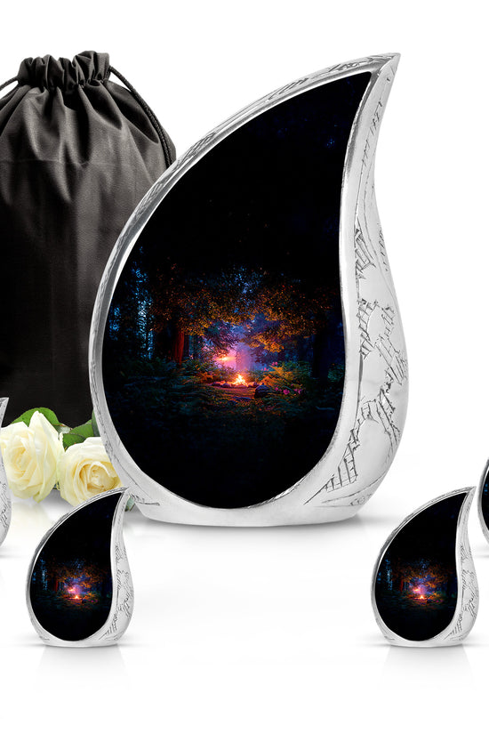 Charcoal Black Campfire Cremation Urn side profile showing urn shape - smooth teardrop contour featuring campfire art - memorial set with one large and four small urns
