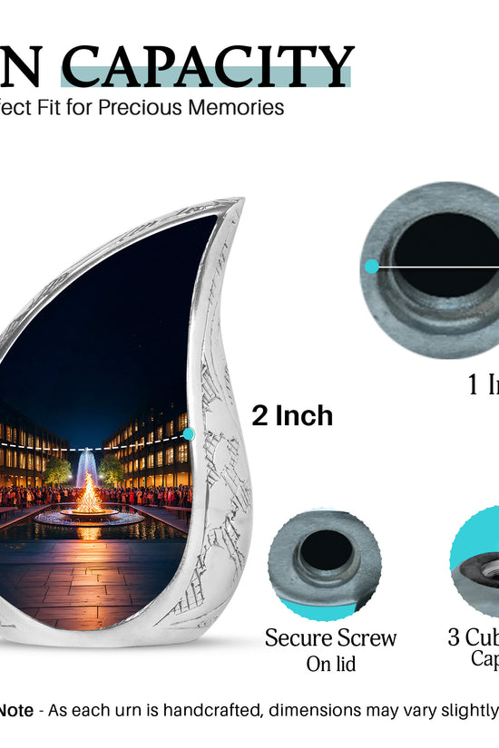 Glossy Black Campfire Cremation Urn angled view of lid and engraved motif - rounded teardrop campfire design with delicate detail - mini keepsake memorial for portion of cremation ashes