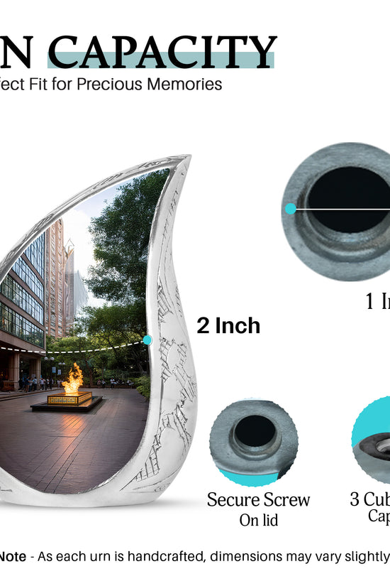 Rich Black Campfire Cremation Urn angled view of lid and engraved motif - rounded teardrop campfire design with delicate detail - mini keepsake memorial for portion of cremation ashes