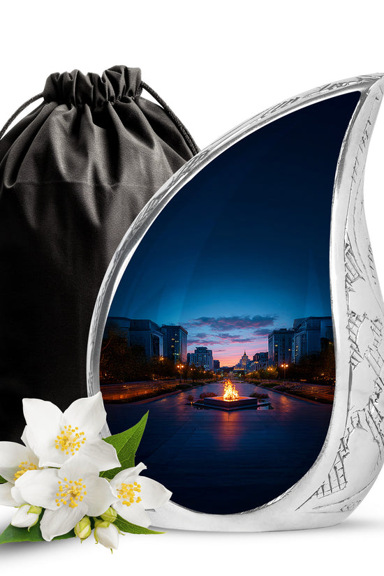 Steel Blue Campfire Cremation Urn front view showing detailed design - smooth teardrop contour featuring campfire art - full-size 10 inch 200 cubic inch adult cremation urn