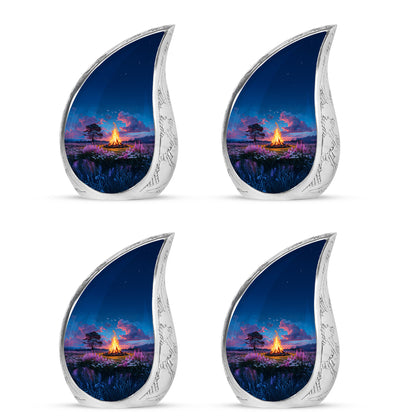 Serene Blue Campfire Cremation Urn close-up of engraving and surface detail - graceful tear-shaped urn with campfire motif - 10 inch aluminum urn for cremated remains
