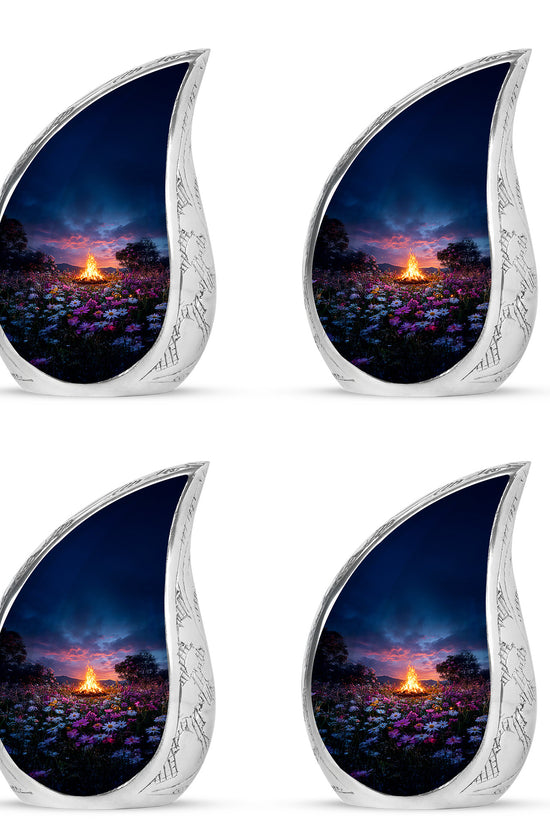 Royal Blue Campfire Cremation Urn close-up of engraving and surface detail - graceful tear-shaped urn with campfire motif - 10 inch aluminum urn for cremated remains