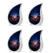 Royal Blue Campfire Cremation Urn close-up of engraving and surface detail - graceful tear-shaped urn with campfire motif - 10 inch aluminum urn for cremated remains