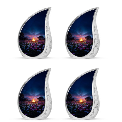 Royal Blue Campfire Cremation Urn close-up of engraving and surface detail - graceful tear-shaped urn with campfire motif - 10 inch aluminum urn for cremated remains