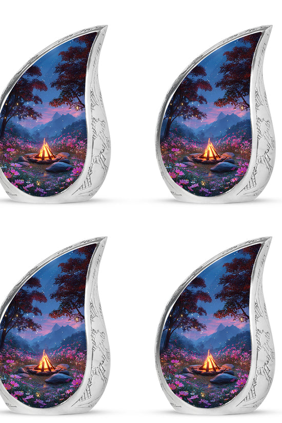 Twilight Blue Campfire Cremation Urn close-up of engraving and surface detail - graceful tear-shaped urn with campfire motif - 10 inch aluminum urn for cremated remains