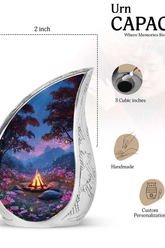 Azure Campfire Cremation Urn angled view of lid and engraved motif - rounded teardrop campfire design with delicate detail - mini keepsake memorial for portion of cremation ashes
