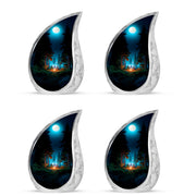 Onyx Black Campfire Cremation Urn close-up of engraving and surface detail - smooth teardrop contour featuring campfire art - 10 inch aluminum urn for cremated remains