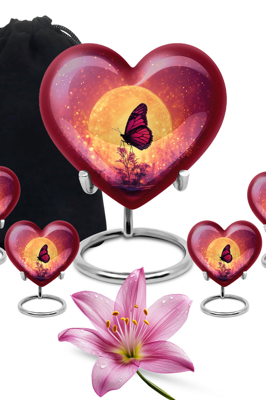 Salmon Pink Butterfly Cremation Urn close-up of engraving and surface detail - compassionate heart-butterfly combination with gentle curves - memorial set with one large and four small urns