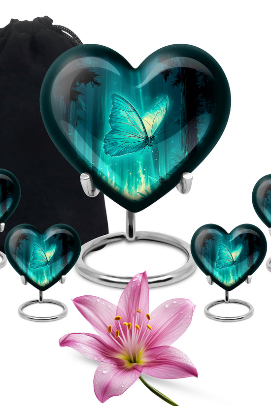 Tropical Teal Butterfly Cremation Urn close-up of engraving and surface detail - romantic heart urn with butterfly motif on aluminum - memorial set with one large and four small urns