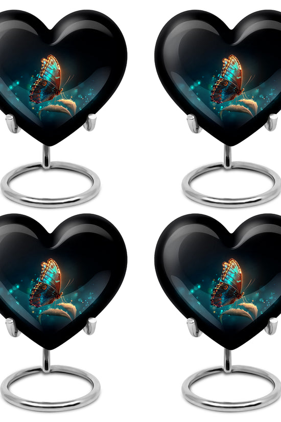 Dark Black Butterfly Cremation Urn angled view of lid and engraved motif - compassionate heart-butterfly combination with gentle curves - 10 inch aluminum urn for cremated remains