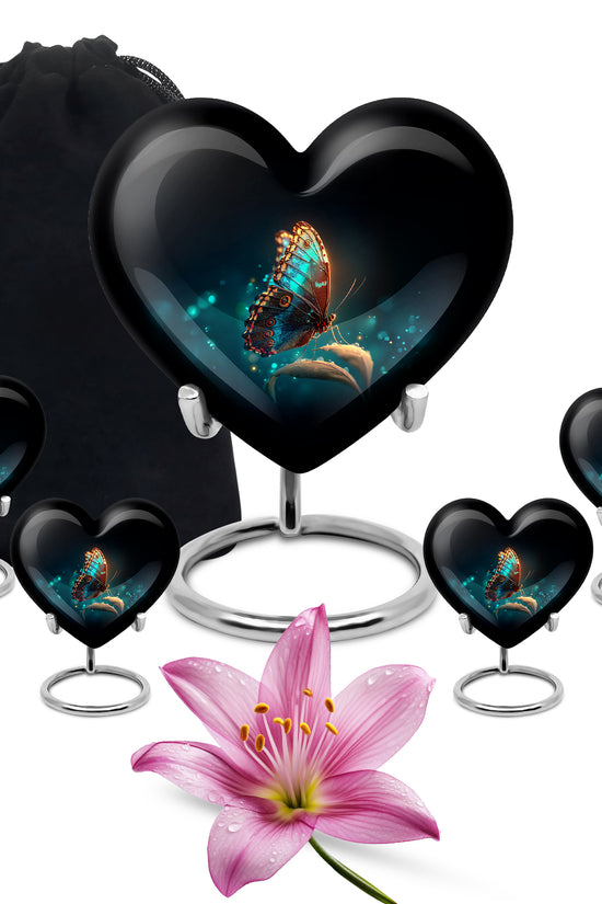 Midnight Black Butterfly Cremation Urn close-up of engraving and surface detail - compassionate heart-butterfly combination with gentle curves - memorial set with one large and four small urns