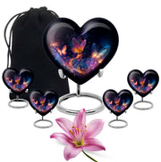 Charcoal Black Butterfly Cremation Urn close-up of engraving and surface detail - compassionate heart-butterfly combination with gentle curves - memorial set with one large and four small urns