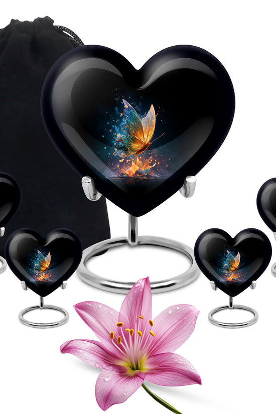 Glossy Black Butterfly Cremation Urn close-up of engraving and surface detail - heart-shaped butterfly design symbolizing eternal love - memorial set with one large and four small urns