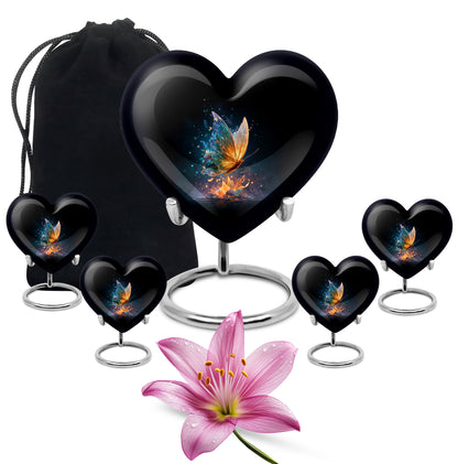 Glossy Black Butterfly Cremation Urn close-up of engraving and surface detail - heart-shaped butterfly design symbolizing eternal love - memorial set with one large and four small urns