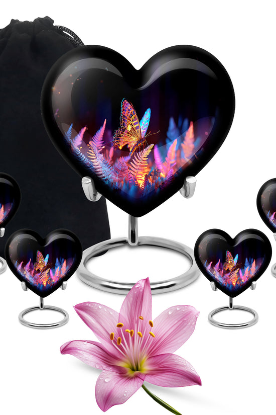 Onyx Black Butterfly Cremation Urn close-up of engraving and surface detail - compassionate heart-butterfly combination with gentle curves - memorial set with one large and four small urns