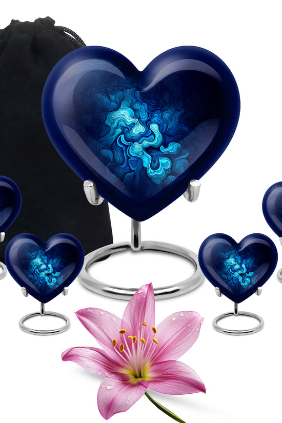 Misty Blue Blue Cremation Urn close-up of engraving and surface detail - heart-shaped blue design symbolizing eternal love - memorial set with one large and four small urns