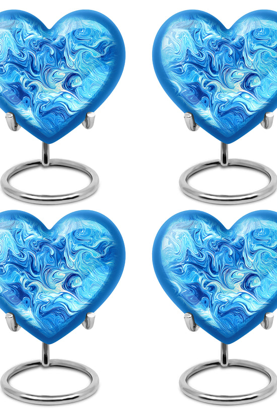 Pastel Blue Blue Cremation Urn angled view of lid and engraved motif - heart-shaped blue design symbolizing eternal love - 10 inch aluminum urn for cremated remains