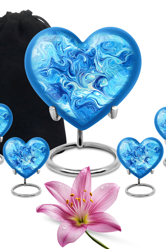 Powder Blue Blue Cremation Urn close-up of engraving and surface detail - loving heart memorial featuring blue pattern - memorial set with one large and four small urns