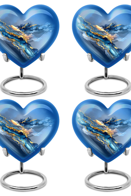 Pastel Blue Blue Cremation Urn angled view of lid and engraved motif - heart-shaped blue design symbolizing eternal love - 10 inch aluminum urn for cremated remains