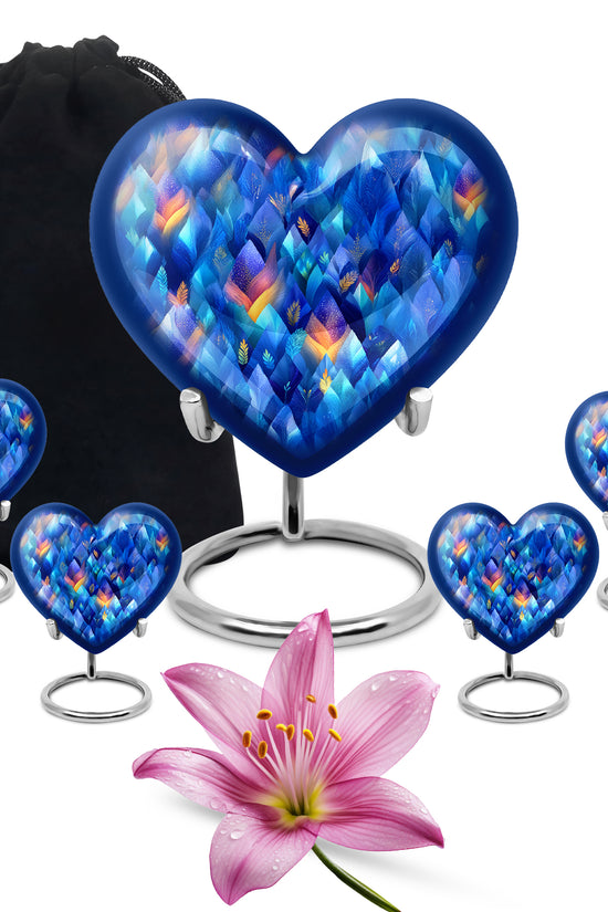 Soft Blue Blue Cremation Urn close-up of engraving and surface detail - romantic heart urn with blue motif on aluminum - memorial set with one large and four small urns