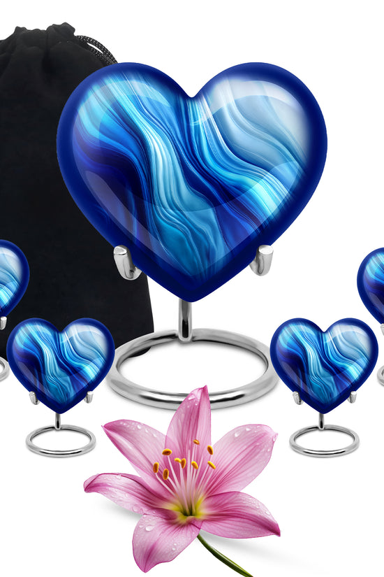Indigo Blue Cremation Urn close-up of engraving and surface detail - loving heart memorial featuring blue pattern - memorial set with one large and four small urns