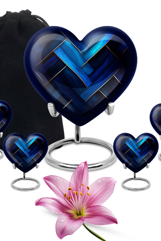 Azure Blue Cremation Urn close-up of engraving and surface detail - heart-shaped blue design symbolizing eternal love - memorial set with one large and four small urns