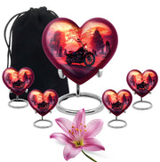 Wine Red Bike Cremation Urn close-up of engraving and surface detail - loving heart memorial featuring bike pattern - memorial set with one large and four small urns