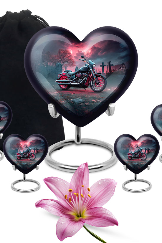 Misty Blue Bike Cremation Urn close-up of engraving and surface detail - heart-shaped bike design symbolizing eternal love - memorial set with one large and four small urns