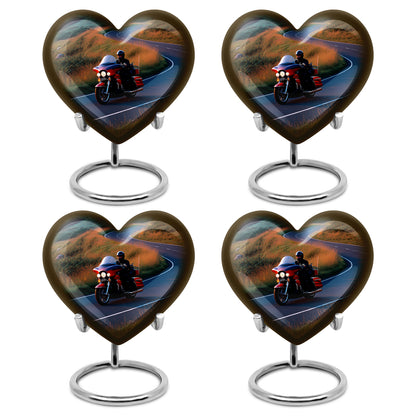Sapphire Blue Bike Cremation Urn angled view of lid and engraved motif - compassionate heart-bike combination with gentle curves - 10 inch aluminum urn for cremated remains