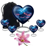 Royal Blue Bike Cremation Urn close-up of engraving and surface detail - romantic heart urn with bike motif on aluminum - memorial set with one large and four small urns