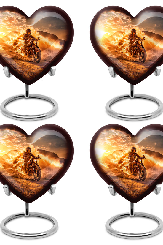 Warm Gold Bike Cremation Urn angled view of lid and engraved motif - compassionate heart-bike combination with gentle curves - 10 inch aluminum urn for cremated remains