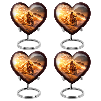 Warm Gold Bike Cremation Urn angled view of lid and engraved motif - compassionate heart-bike combination with gentle curves - 10 inch aluminum urn for cremated remains