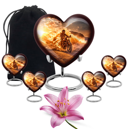 Amber Gold Bike Cremation Urn close-up of engraving and surface detail - heart-shaped bike design symbolizing eternal love - memorial set with one large and four small urns
