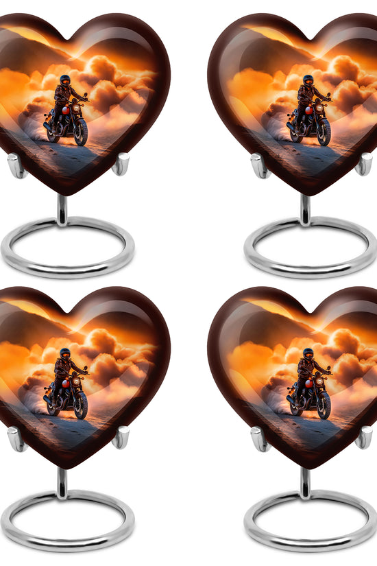 Burnished Gold Bike Cremation Urn angled view of lid and engraved motif - compassionate heart-bike combination with gentle curves - 10 inch aluminum urn for cremated remains