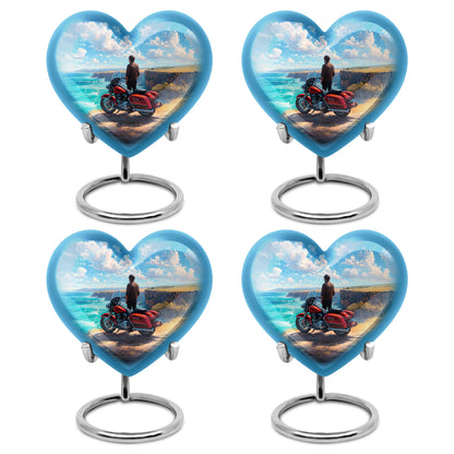 Soft Blue Bike Cremation Urn angled view of lid and engraved motif - romantic heart urn with bike motif on aluminum - 10 inch aluminum urn for cremated remains