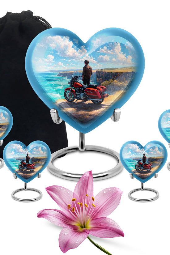 Calming Blue Bike Cremation Urn close-up of engraving and surface detail - romantic heart urn with bike motif on aluminum - memorial set with one large and four small urns