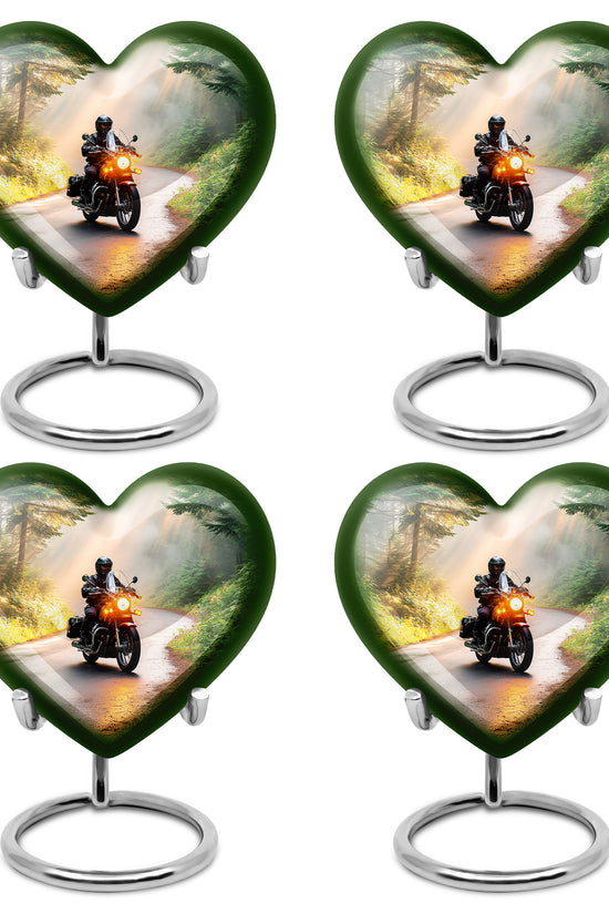 Royal Gold Bike Cremation Urn angled view of lid and engraved motif - compassionate heart-bike combination with gentle curves - 10 inch aluminum urn for cremated remains