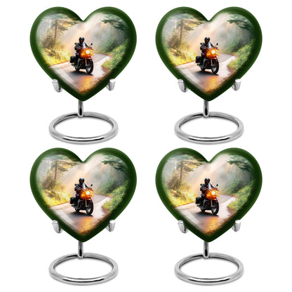 Royal Gold Bike Cremation Urn angled view of lid and engraved motif - compassionate heart-bike combination with gentle curves - 10 inch aluminum urn for cremated remains